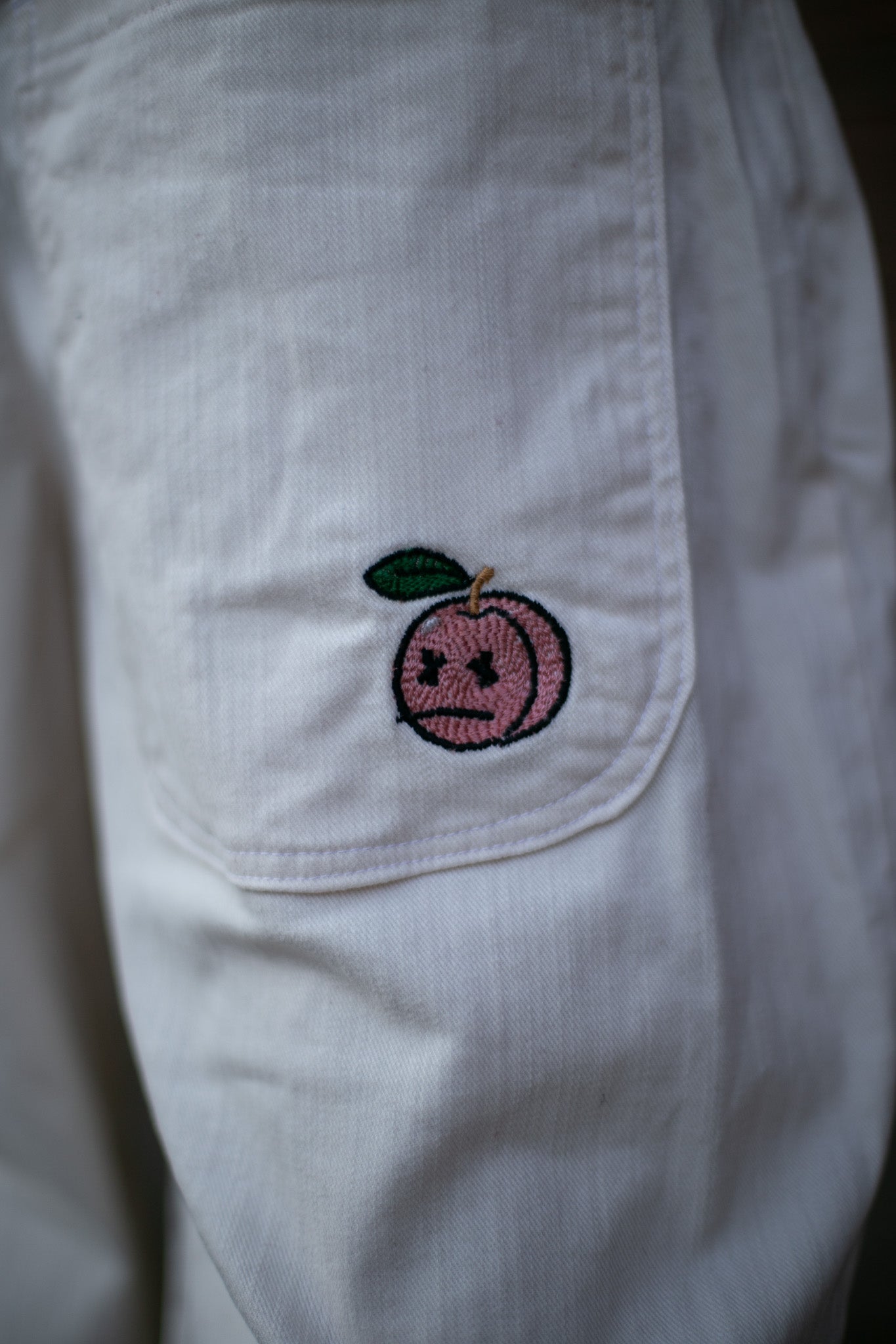 Cream white peach jeans